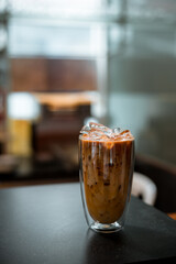 glass of coffee with milk on the table