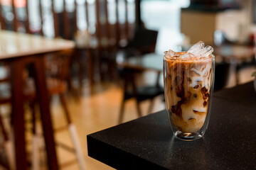 glass of coffee with milk on the table