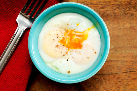 coddled eggs and runny orange yolks