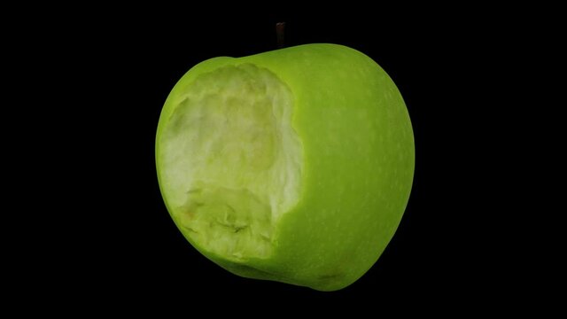 Realistic render of a spinning green Granny Smith apple with bites taken out on black background. The video is seamlessly looping, and the 3D object is scanned from a real apple.
