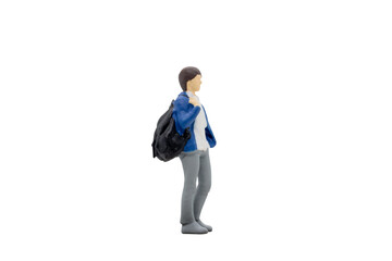 Miniature people traveller standing isolated on white background with clipping path