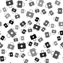 Black First aid kit icon isolated seamless pattern on white background. Medical box with cross. Medical equipment for emergency. Healthcare concept. Vector.
