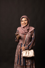 Full length casual young fashion holding bag posing