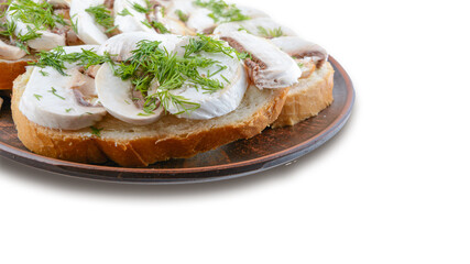 Sandwiches with raw mushrooms champignon and dill on a plate, white isolated background