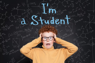 Shocked kid boy against science background