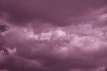 Dark pink clouds close-up. Cloud landscape.