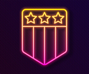 Glowing neon line Shield with stars and stripes icon isolated on black background. United States of America country flag. 4th of July. USA Independence day. Vector.
