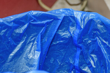 Fragment of the inner surface of a plastic garbage bag