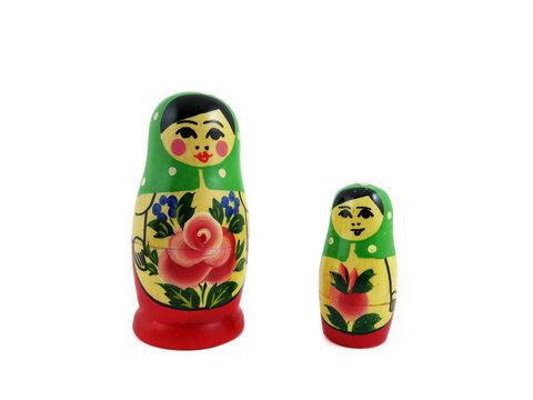 Two matryoshka dolls small and large on a white background    