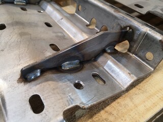 Welding seam onto steel sheet metal part. texture,surface