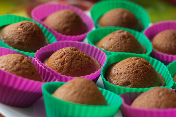 Delicious chocolate cupcakes in small baskets with selective focus