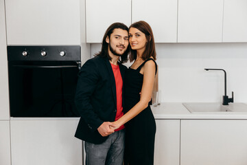 Happy couple cute touch each other in the kitchen