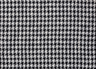Fashionable fabric made of wool with pepita pattern in black and off-white, textile background image - 407854187