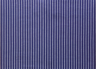 Dark blue fabric with white pinstripes, fisherman shirt, textile background image - 407854321