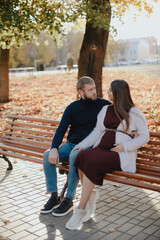 Young adult couple in love in autumn Park