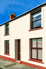 Old fashioned architecture buildings of colourful terraced town houses in Pembrokeshire Wales UK, stock photo image