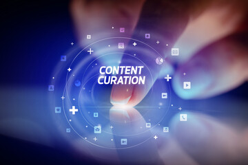 Finger touching tablet with social media icons and CONTENT CURATION