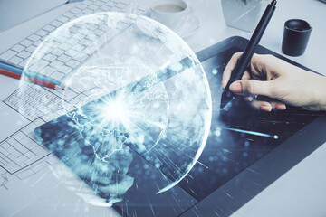 Double exposure of business theme sketch hologram and woman holding and using a mobile device.