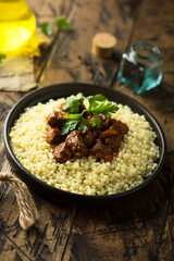 Ptitim with spicy beef ragout