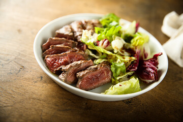 Mixed salad with grilled beef steak