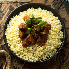 Ptitim with spicy beef ragout