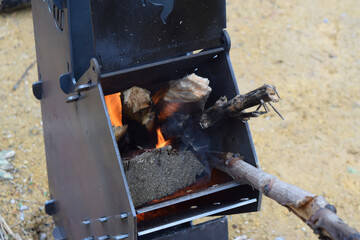 blacksmith working in the fireplace