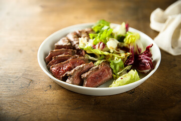 Mixed salad with grilled beef steak