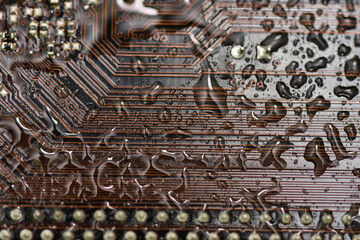 Electronic circuit sprayed with water