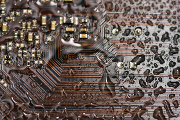 Electronic circuit sprayed with water