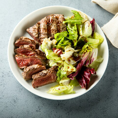 Mixed salad with grilled beef steak