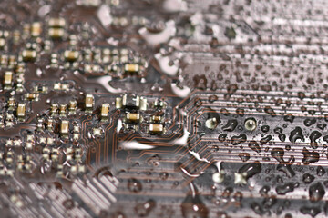 Electronic circuit sprayed with water