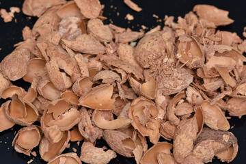 a bunch of fried almond shells