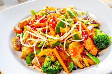 sweet and sour chicken with rice and vegetables