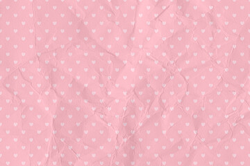 Crumpled pink paper texture background, dot pattern. Valentine's day background concept