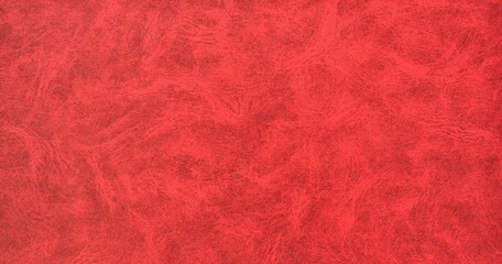 Abstract red with black streaks textured aged paper background with space for text.