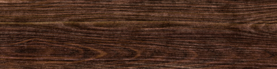 wenge oak, a flat surface of natural wood with a rich close-up pattern. plywood textured wooden background or wood surface of the old at grunge dark grain wall texture of panel top view. Vintage teak.