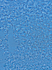 ice patterns on winter glass