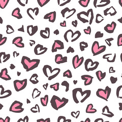 Valentine Leopard or cheetah seamless pattern. Trendy animal print. Spotted pink and dark gray hearts imitate jaguar skin. Vector background for fabric, textile, wallpaper, wrapping paper, etc