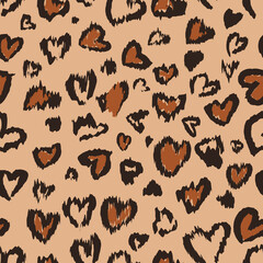 Valentine Leopard or cheetah seamless pattern. Trendy animal print. Spotted hearts imitate jaguar fur. Vector background for wallpaper, textile, fabric, wrapping paper, etc