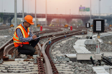 engineer Sitting on railway inspection. construction worker on railways. Engineer work on railway....