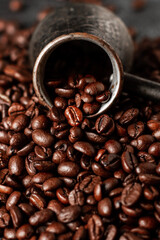 Coffee turk with coffee beans on conrete background.