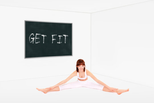 Athletic young woman stretching in front of a chalkboard, get fit is written on the board