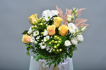 fresh flowers in paper boxes