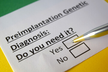 Obraz premium One person is answering question about preimplantation genetic diagnosis.