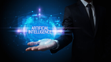 Obraz premium Man hand holding ARTIFICIAL INTELLIGENCE inscription, technology concept