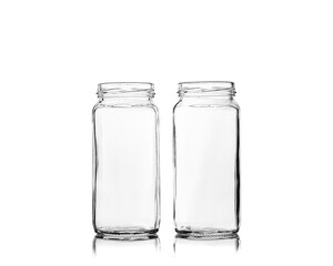 Two empty glass jars isolated on white background