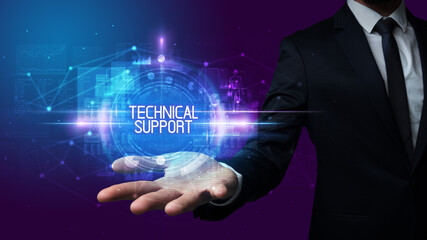 Man hand holding TECHNICAL SUPPORT inscription, technology concept