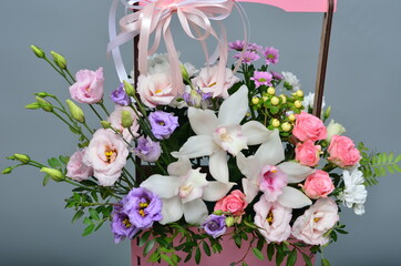 fresh flowers in paper boxes