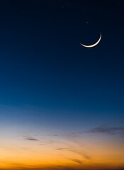 Crescent moon and clouds on twilight in the evening