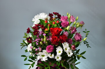 fresh flowers in paper boxes